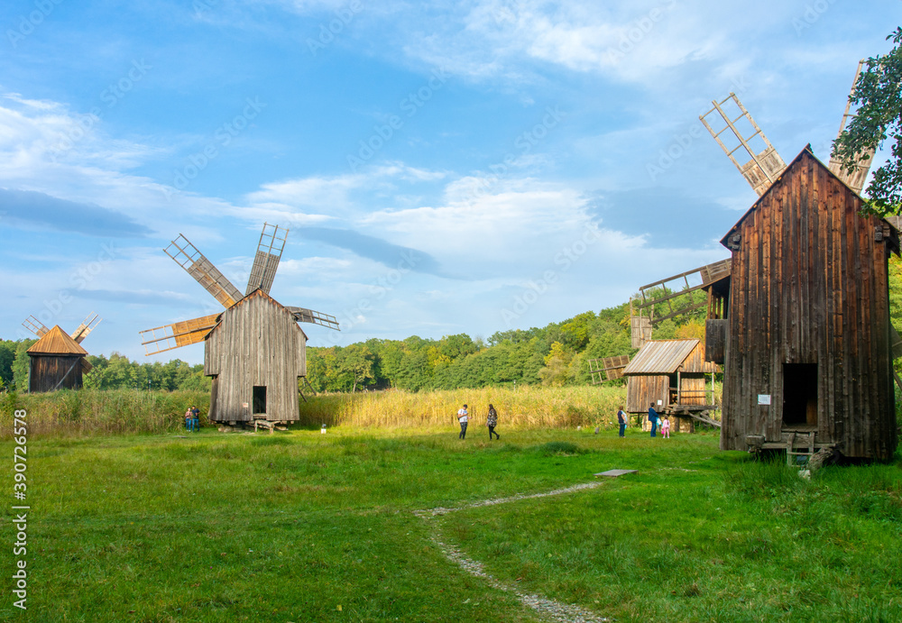 Sticker SIBIU, ROMANIA - Oct 04, 2020: old windmills at the Astra Sibiu Village Museum