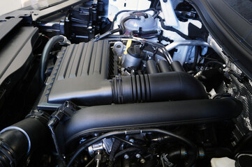 Fototapeta na wymiar Modern clean luxury car engine close up.