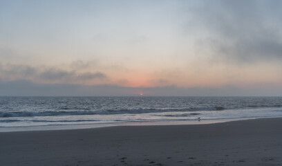 Beautiful foggy Zuma Beach sunset, Malibu, Southern California 