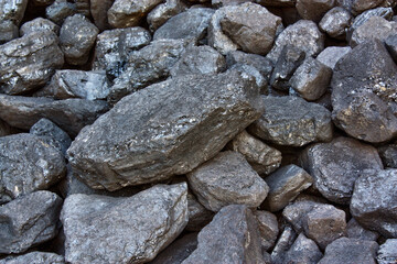 Fototapeta na wymiar Pile of coal from mine deposit of black mineral stones
