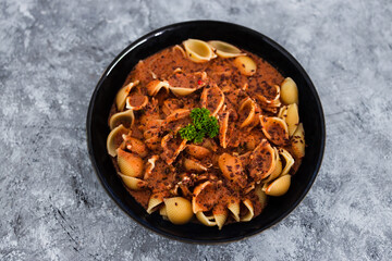 plant-based food, vegan red pesto shell pasta dish