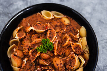 plant-based food, vegan red pesto shell pasta dish