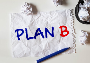 Plan B word on grey background