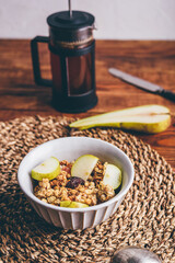 Serving of Granola with Pear and Raisins