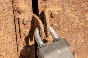 Old Lock on Rusted steel doors