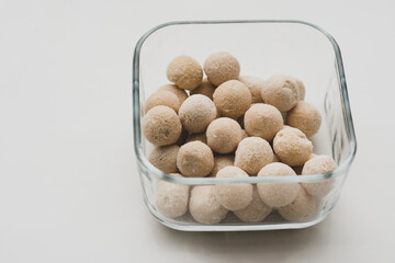 balls of kashk in square glass bowl