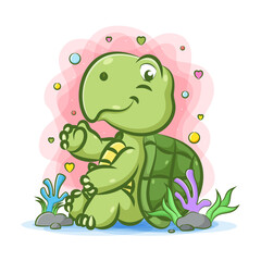 The sitting near the stone under the water with the happy face