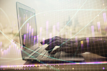 Double exposure of woman hands typing on computer and forex chart hologram drawing. Stock market invest concept.