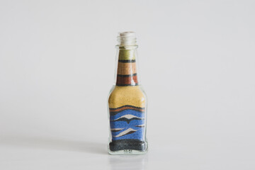 sand painting in a glass bottle
