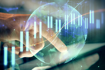 Multi exposure of man's hands holding and using a phone and financial chart drawing. Market analysis concept.