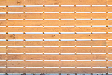 facade with wooden pallet curtain wall