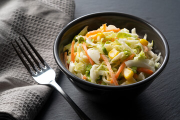 Coleslaw on a black background