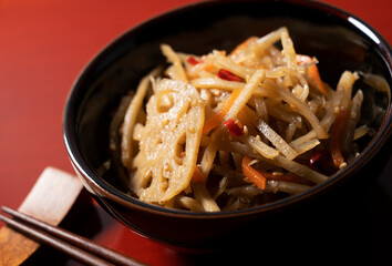 Kinpira on a red Japanese-style background