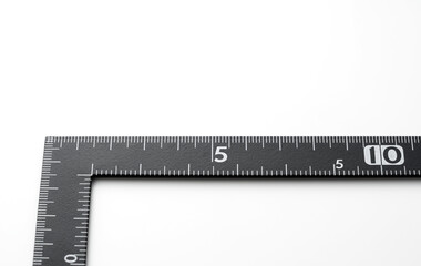 Ruler at right angle on a white background