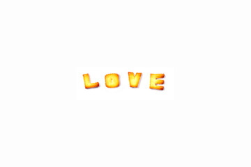 LOVE alphabet cracker isolated on white background. Top view