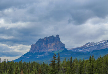 A landscape picture of the mountain and adjacent forest at the Banff National Park. 