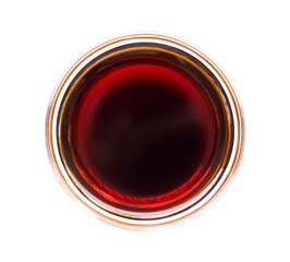 Dish of soy sauce isolated on white background with clipping path. Top view. Flat lay.
