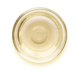 Olive oil or cooking oil in glass bowl isolated on white background with clipping path. Top view. Flat lay.