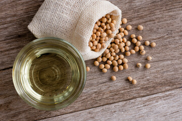 Soy oil on wood table.