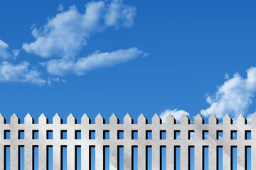 white fence and blue sky