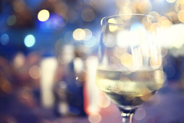 evening in a restaurant, blurred abstract background, bokeh, alcohol concept, wine glasses in a bar