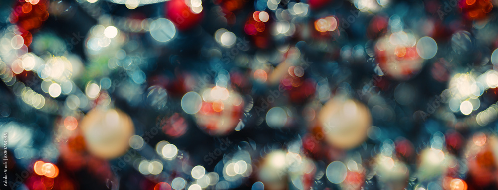Poster merry christmas and happy new year word on abstract bokeh of  ball and string lights on xmas tree.holiday celebration greeting card