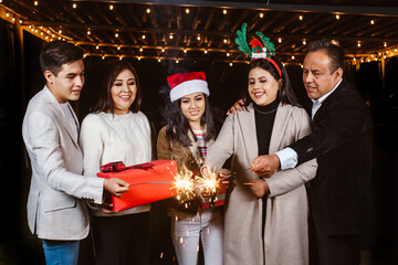 Latin christmas party with a group of mexican friends 