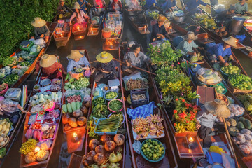 Damnoen Saduak Floating Market or Amphawa. Local people sell fruits, traditional food on boats in canal, Ratchaburi District, Thailand. Famous Asian tourist attraction destination. Festival in Asia. - obrazy, fototapety, plakaty