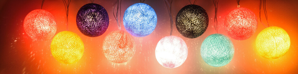 Image in the form of a banner from a Christmas electric electric garland of balls