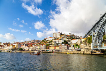 Fototapeta na wymiar Douro River, overlooking Porto and Bridge, Portugal