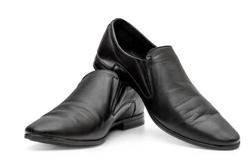 Pair of black classic leather shoes on white.