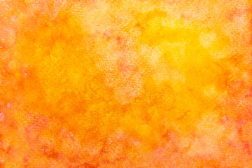Blank colorful watercolor background. Hand painted orange and yellow watercolor on paper background.

