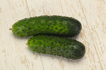 Ripe fresh green two cucumbers