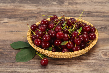 Sweet ripe cherry with leaves