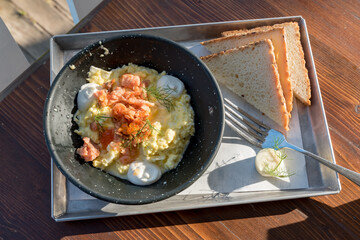 Scrambled eggs with salmon and chives