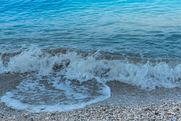 Sea waves on the pebble beach