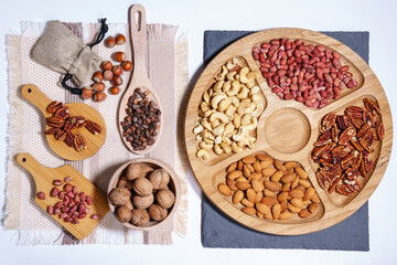 Walnuts, cashew, almond, pecan, hazelnut, peanuts Healthy super food. Mix of nuts top view.