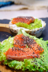 Super food protein toast crusty bread with salmon, cream cheese salad and Chia seeds
