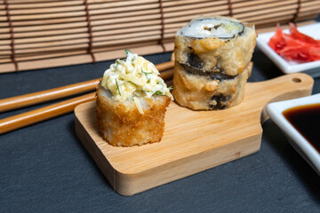 sushi rolls Japanese cuisine. Tempura rolls are special hot close up rolls