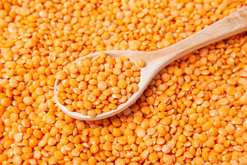 orange lentils in wooden bowl. Healthy lifestyle. Vegetarian and vegan diet.