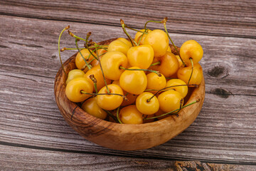 Sweet ripe yellow cherry heap