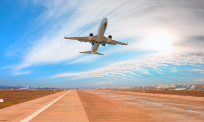 White Passenger plane take-off runway from airport 