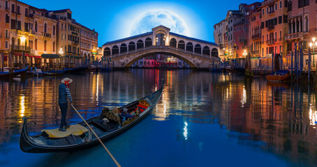 Gondola near Rialto Bridge with full moon - Venice, Italy "Elements of this image furnished by NASA" © muratart
