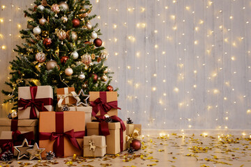 Beautiful decorated christmas tree and gift boxes with copy space