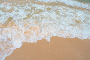 Fototapeta na wymiar Beautiful quiet white sand beach and sea wave in Tropical ocean summer time.