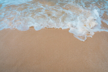 Beautiful quiet white sand beach and sea wave in Tropical ocean summer time.