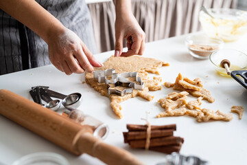 woman hands baking cookies at the kitchen