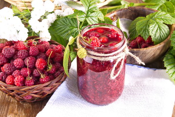 Homemade raspberry jam made from fresh wild berries preparation for winter sweet treat