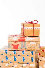 Obraz premium Many gifts in wrapped boxes on white background