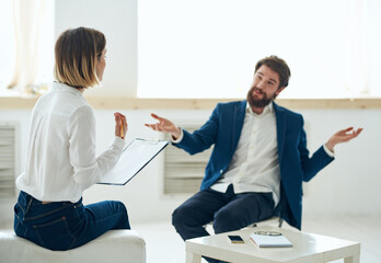 A man at the reception of a psychologist communication consultation depression treatment